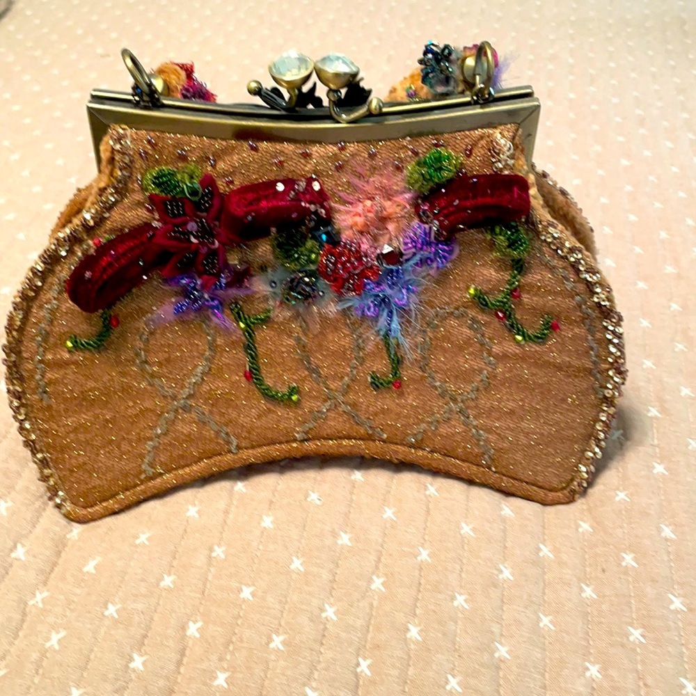 Like new satchel. shoulder strap-chain & beads.  Velvet & beaded appliqués.